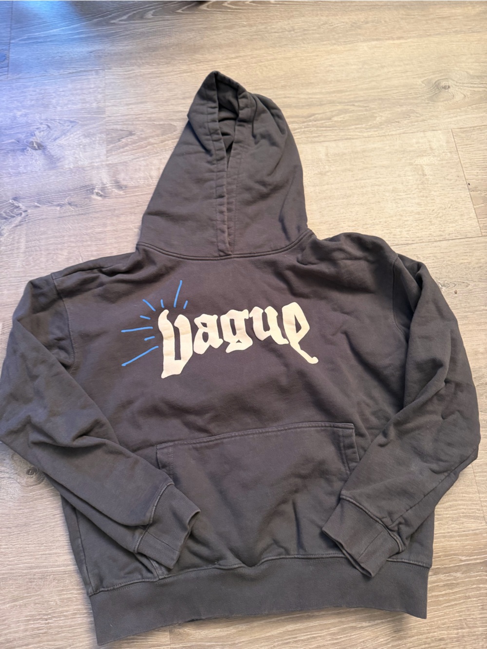 Black Hoodie with White Graphic and Blue Accent